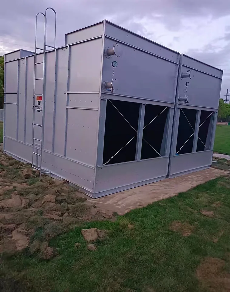 Compact ground-mounted twin-cell cooling tower