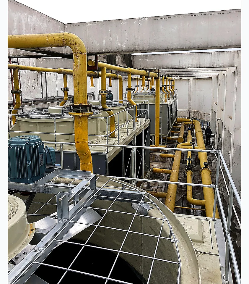 Round cooling tower project with industrial piping