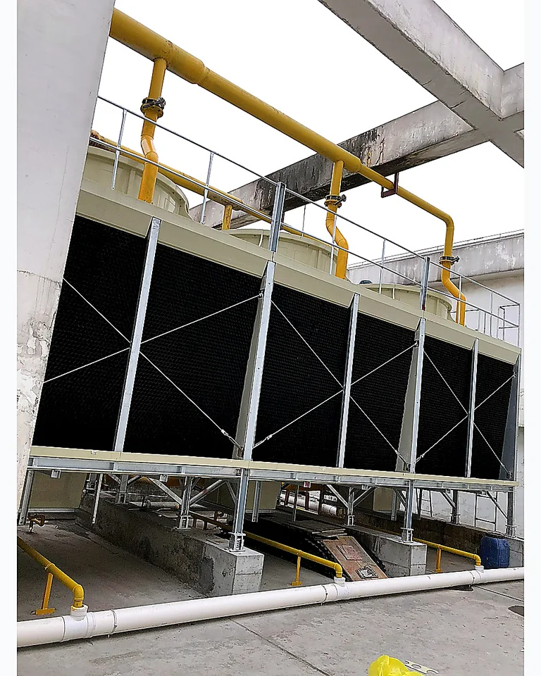 Cooling tower side access and piping layout
